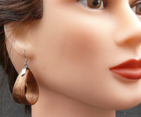 Model wearing organic Natural Bentwood Dangle and drop Teardrops -Australian native Wooden earrings-Australia-hypoallergenic