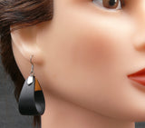 Model wearing organic Natural Bentwood Dangle and drop Teardrops -Australian native Wooden earrings-Australia-hypoallergenic