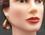 Model wearing organic Natural Bentwood Dangle and drop Teardrops -Australian native Wooden earrings-Australia-hypoallergenic